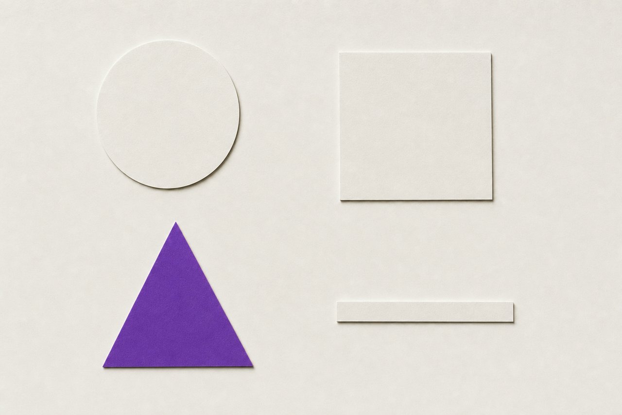 Flat paper cut-out shapes spaced generously apart: a circle, a square, a triangle and a long thin bar, the triangle violet.